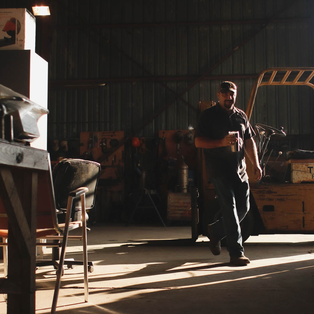 Man walking through hvac sheet metal shop